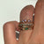 Nokes Emerald Three Stone Ring