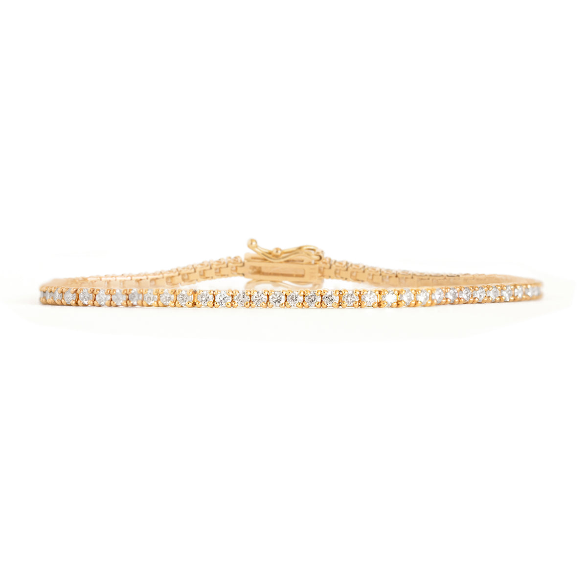 This tennis bracelet is crafted with dazzling lab or natural diamonds, making it luxurious yet minimalistic fine jewelry&amp;nbsp;for any occasion. Its timeless design and movement will be sure to make heads turn. A perfect gift to someone special or yourself. Model is wearing 2CT.
