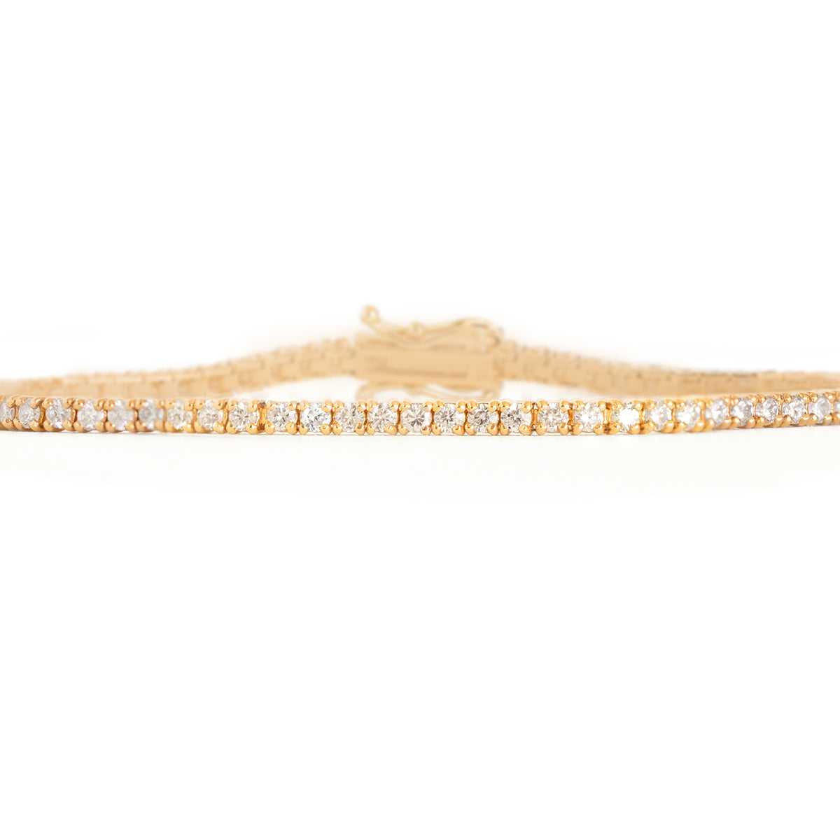 This tennis bracelet is crafted with dazzling lab or natural diamonds, making it luxurious yet minimalistic fine jewelry&amp;nbsp;for any occasion. Its timeless design and movement will be sure to make heads turn. A perfect gift to someone special or yourself. Model is wearing 2CT.