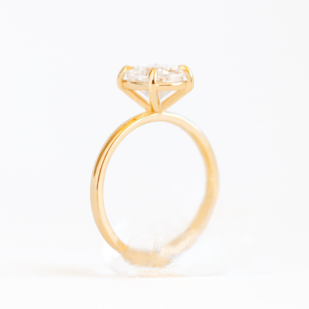 Magnolia Oval Four Prong Solitaire Ring