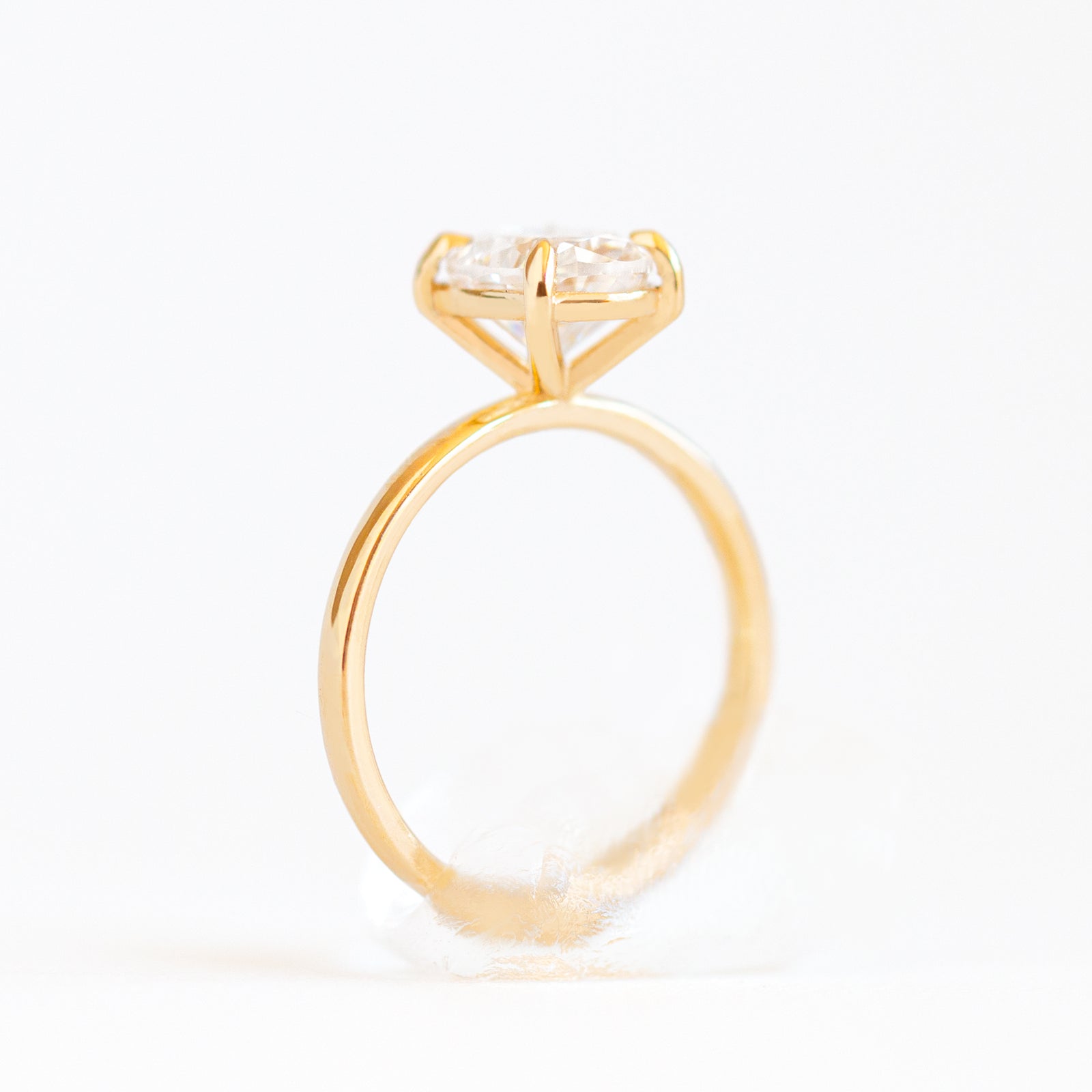 Magnolia Oval Four Prong Solitaire Ring