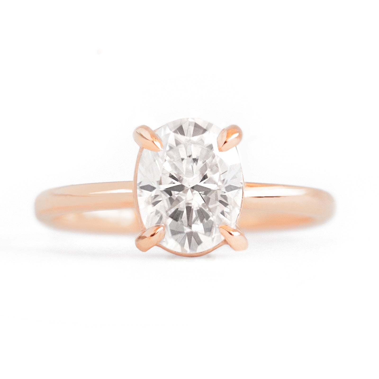 Magnolia Oval Four Prong Solitaire Ring