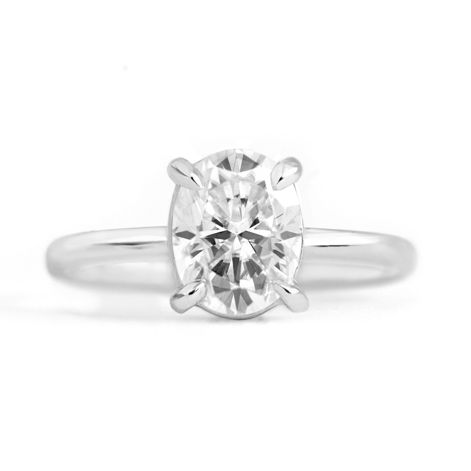 Magnolia Oval Four Prong Solitaire Ring